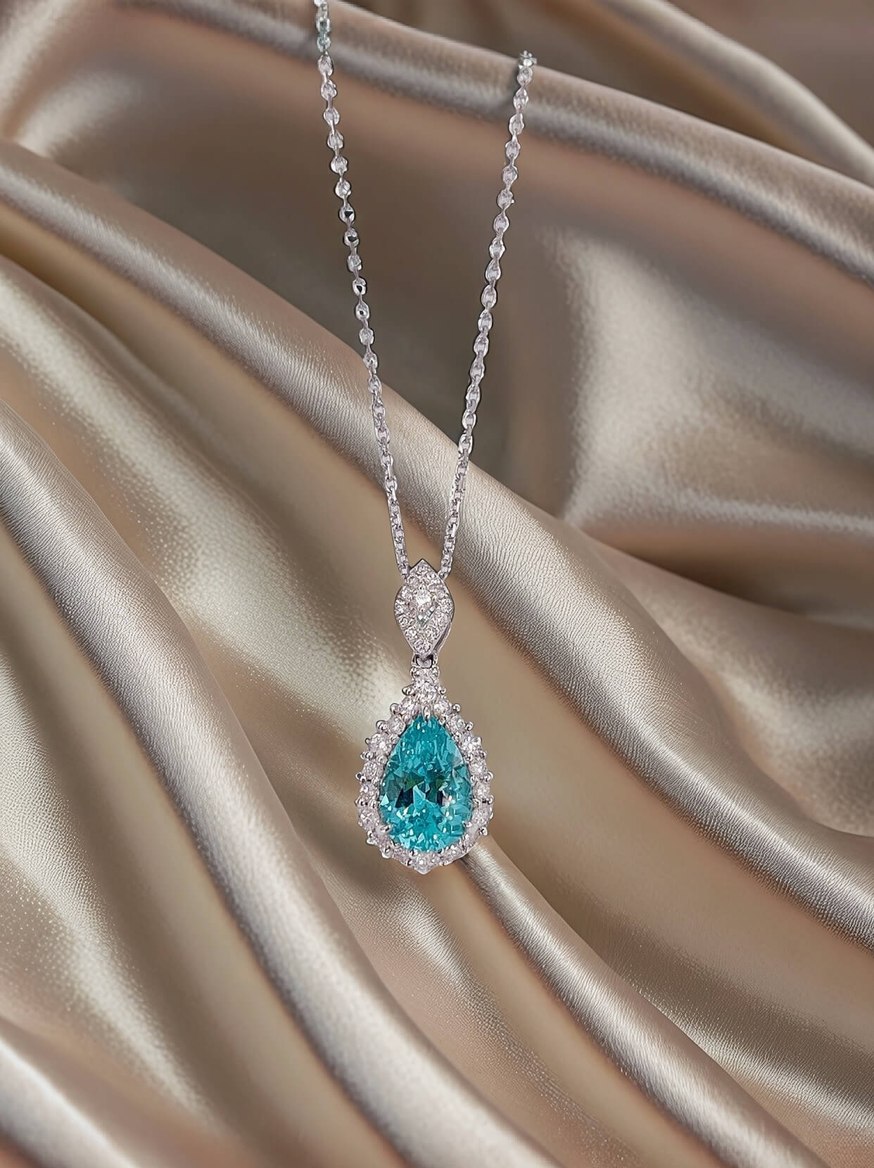 Halo setting pear cut lab grown paraiba pendant necklace 01 Halo setting pear cut lab grown paraiba pendant necklace 01