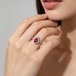Halo setting pear cut lab grown ruby engagement ring