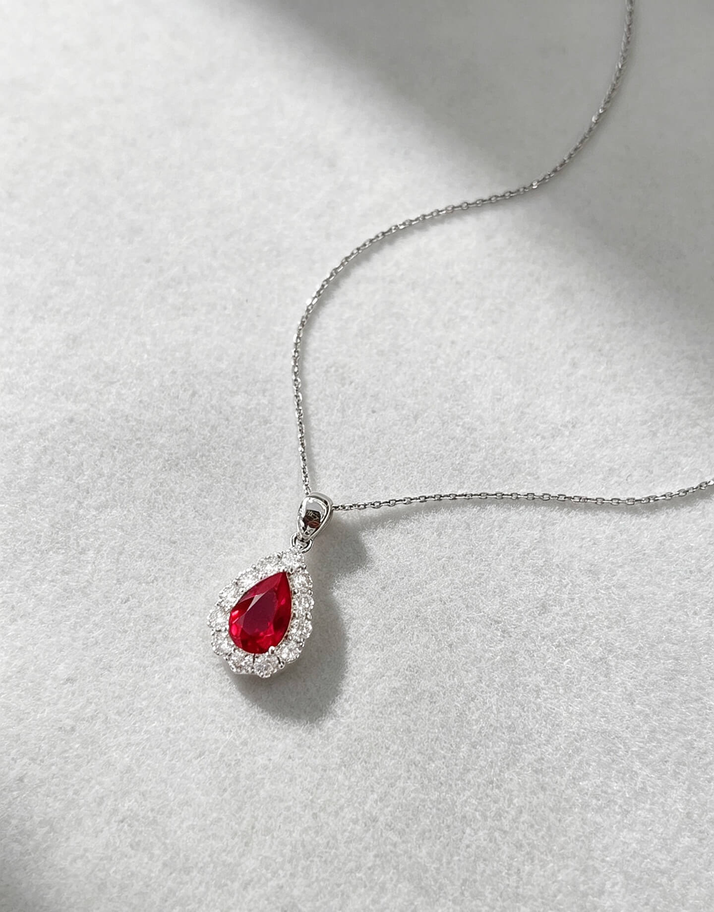 Halo setting pear cut lab grown ruby pendant necklace 03 Halo setting pear cut lab grown ruby pendant necklace 03