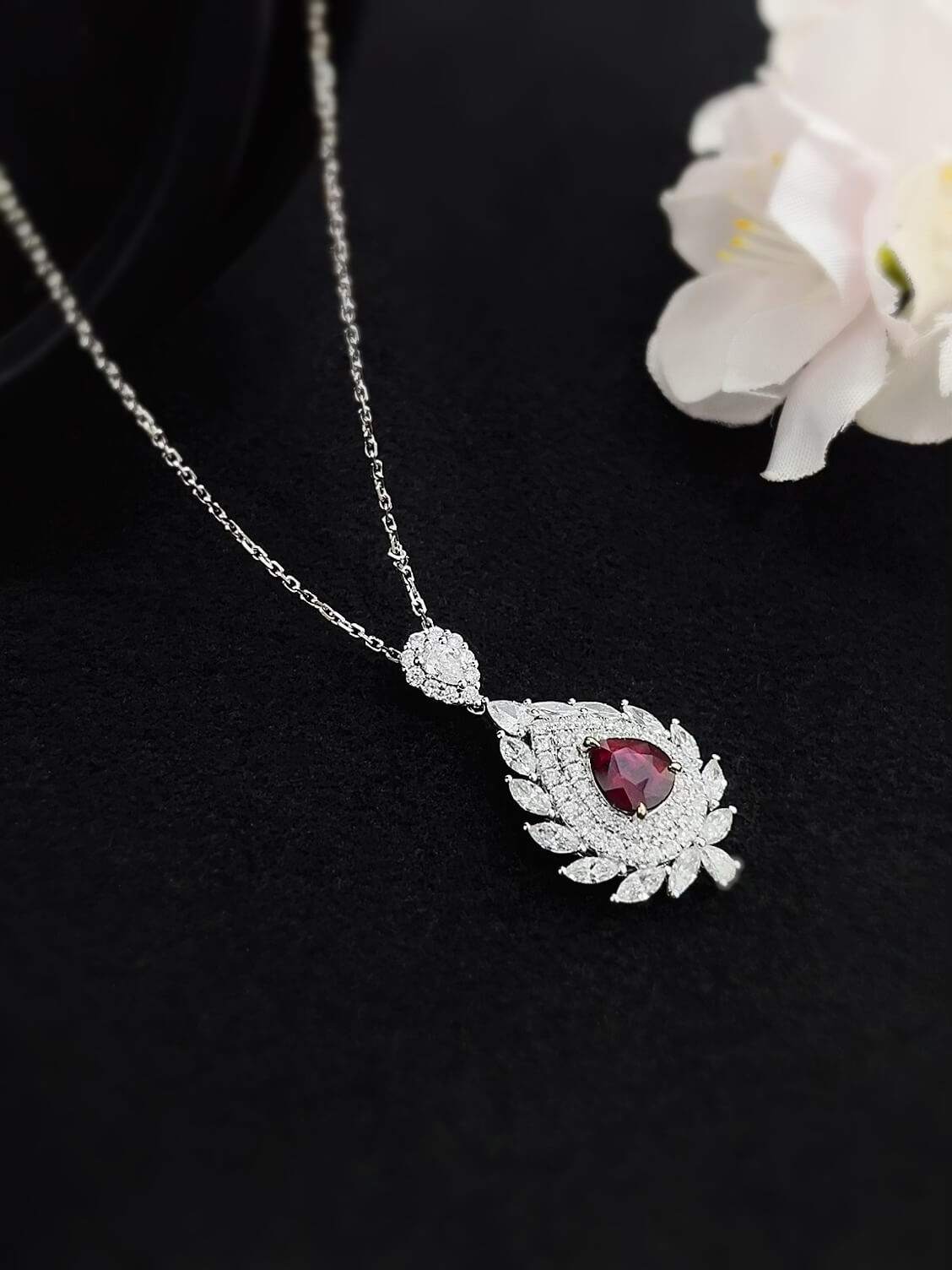 Halo setting pear cut lab grown ruby pendant necklace 01