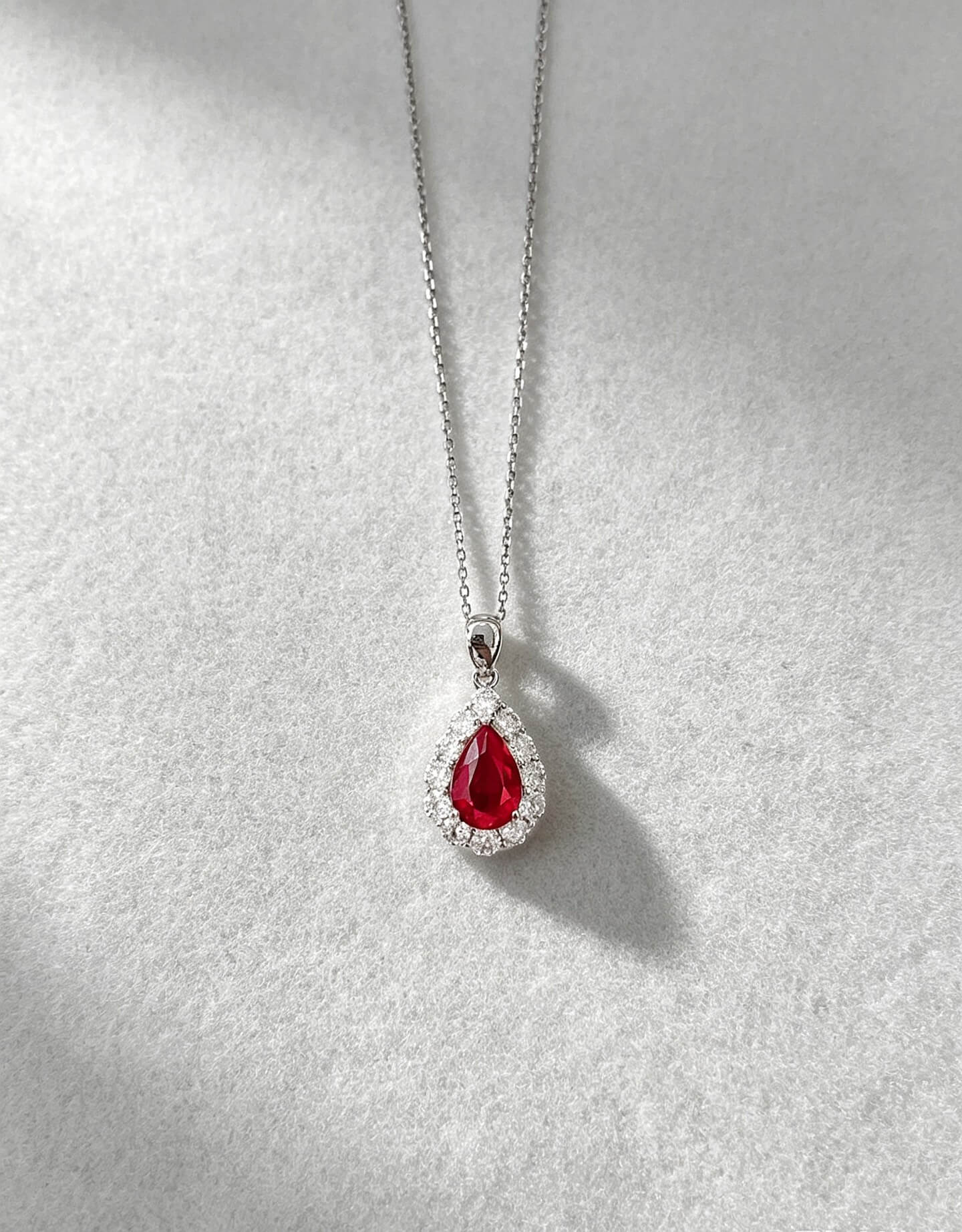 Halo setting pear cut lab grown ruby pendant necklace 03 Halo setting pear cut lab grown ruby pendant necklace 03