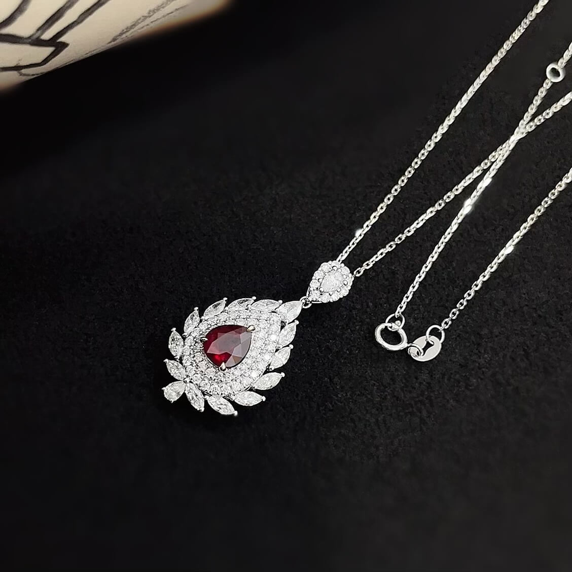 Halo setting pear cut lab grown ruby pendant necklace 01