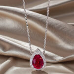 Halo setting pear cut lab grown ruby pendant necklace 2 Halo setting pear cut lab grown ruby pendant necklace 02
