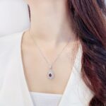 Halo setting pear cut lab grown ruby pendant necklace 01