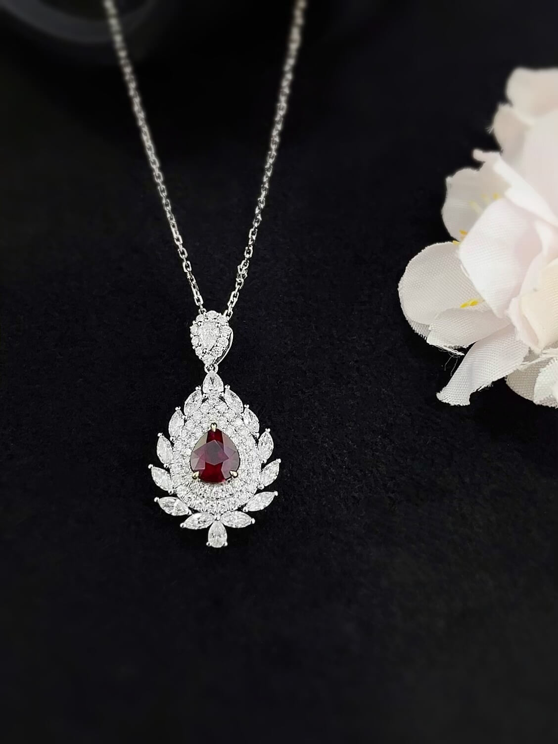 Halo setting pear cut lab grown ruby pendant necklace 01