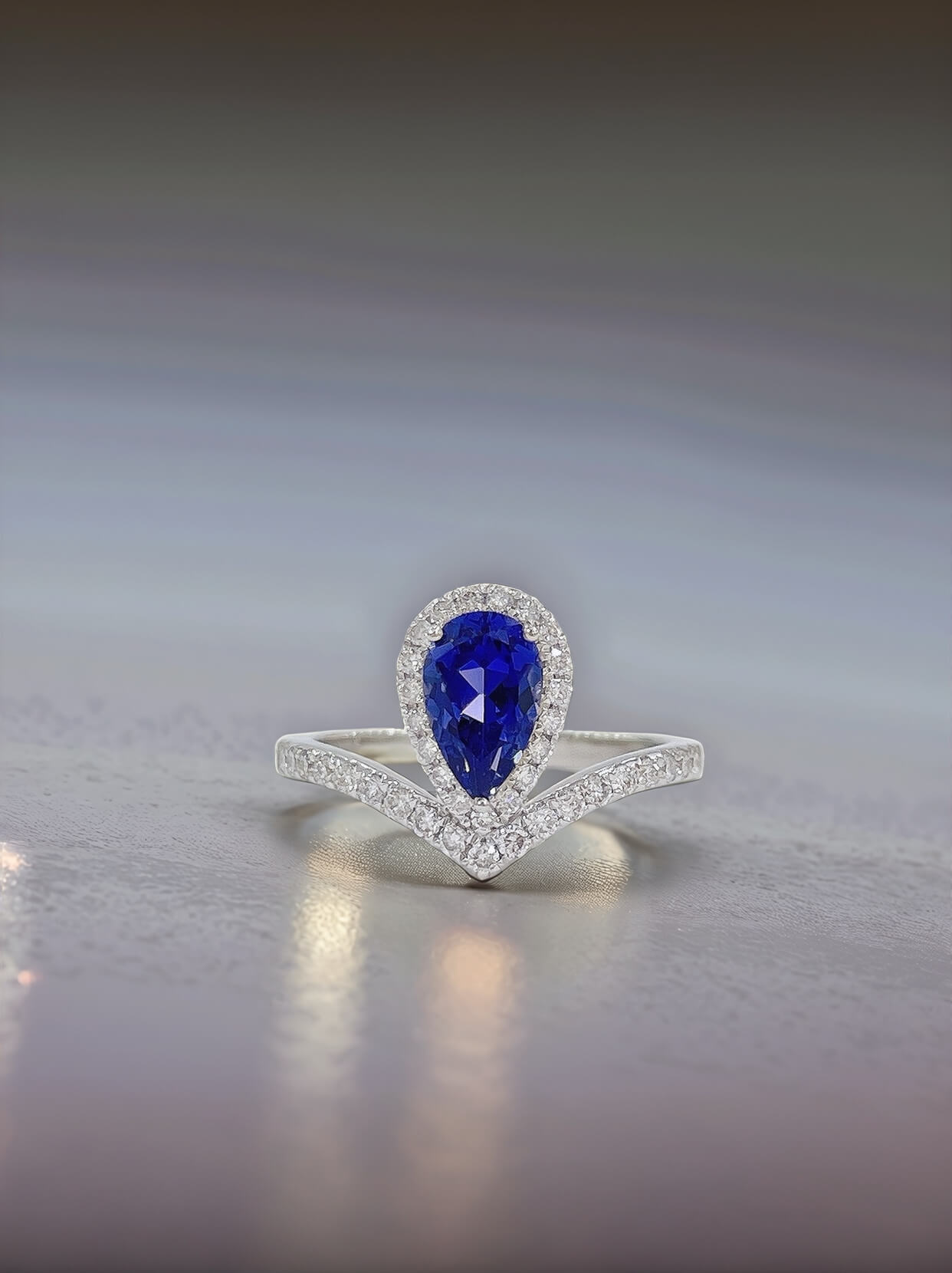 Halo setting pear cut lab grown sapphire engagement ring 04