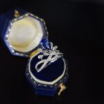 Halo setting pear cut lab grown sapphire engagement ring 3 Halo setting pear cut lab grown sapphire engagement ring 03