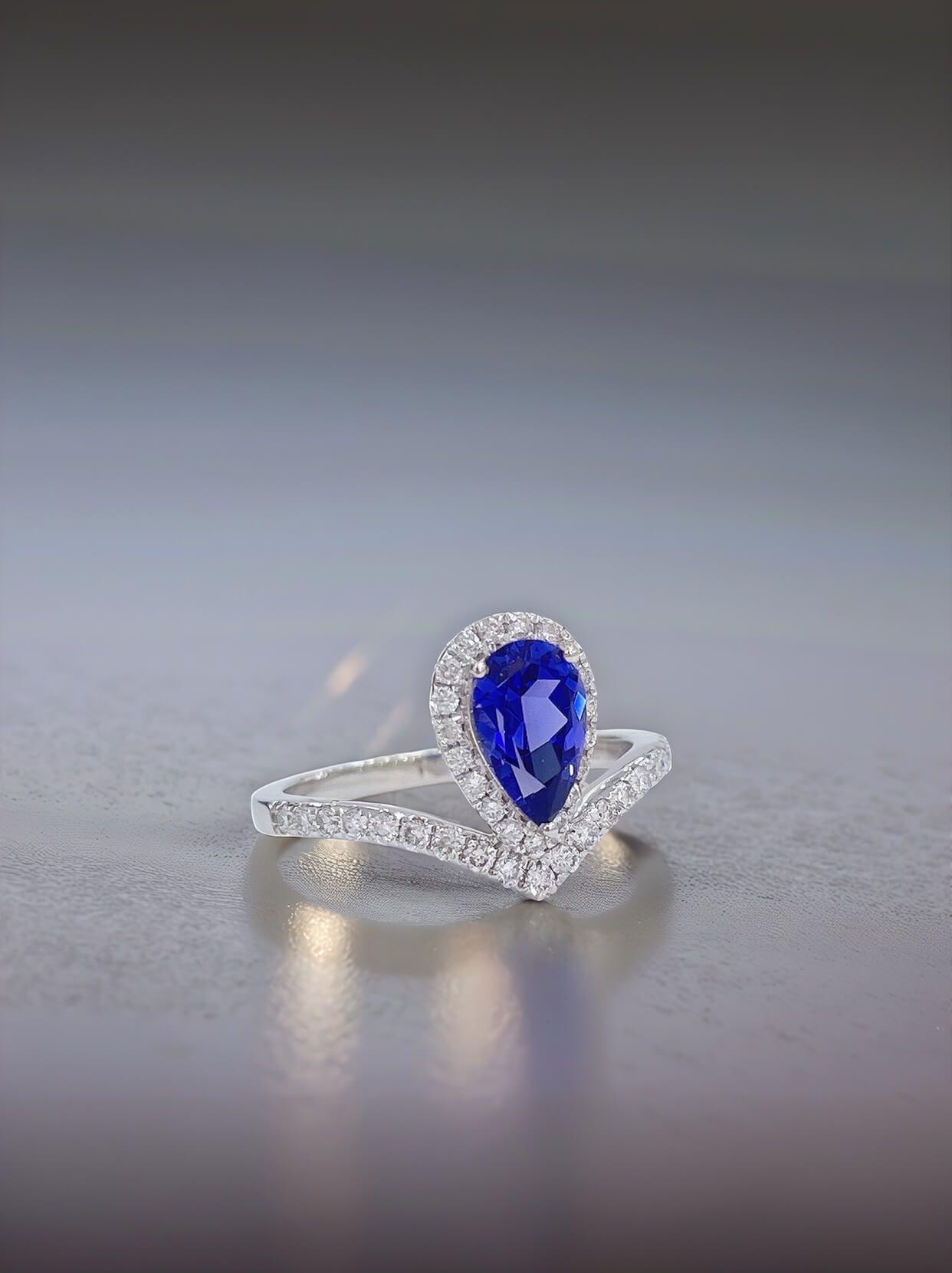 Halo setting pear cut lab grown sapphire engagement ring 04