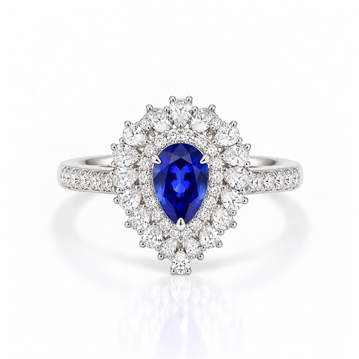 Halo setting pear cut lab grown sapphire engagement ring 01 Halo setting pear cut lab grown sapphire engagement ring 01