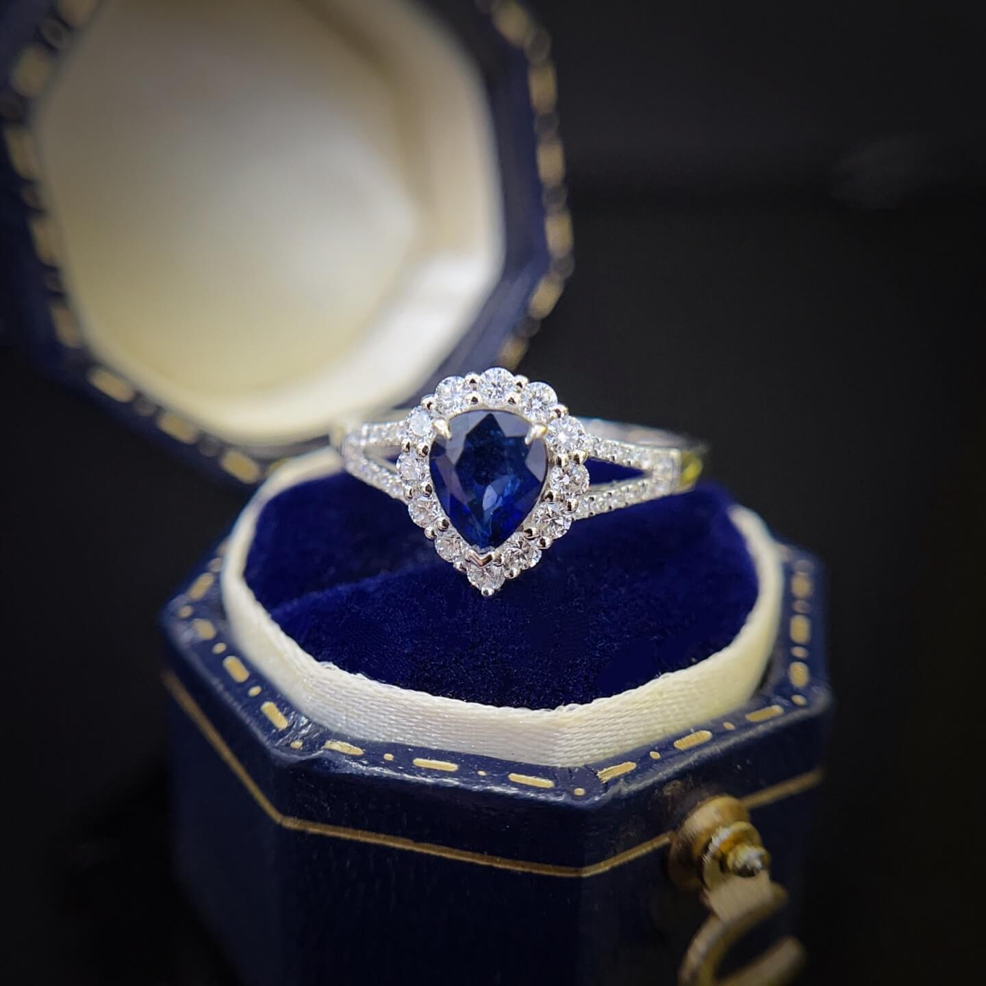 Halo setting pear cut lab grown sapphire engagement ring 02 Halo setting pear cut lab grown sapphire engagement ring 02