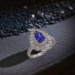Halo setting pear cut lab grown sapphire engagement ring 4 Halo setting pear cut lab grown sapphire engagement ring 01