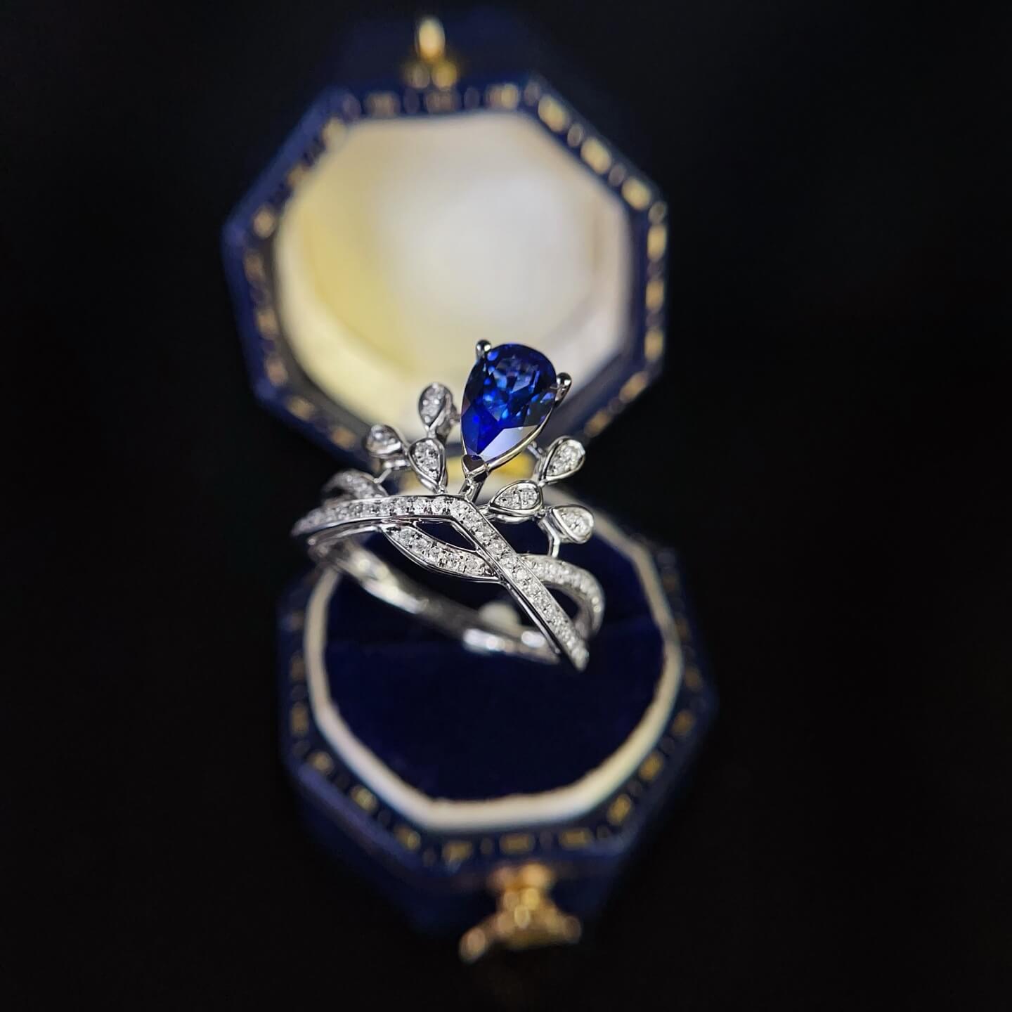 Halo setting pear cut lab grown sapphire engagement ring 03 Halo setting pear cut lab grown sapphire engagement ring 03