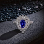Halo setting pear cut lab grown sapphire engagement ring 2 Halo setting pear cut lab grown sapphire engagement ring 01