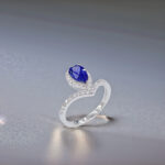 Halo setting pear cut lab grown sapphire engagement ring 04
