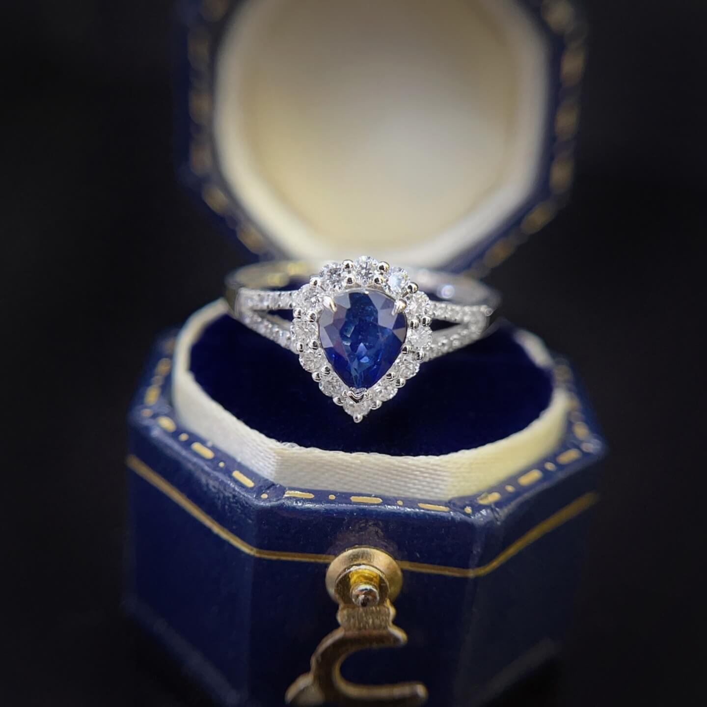 Halo setting pear cut lab grown sapphire engagement ring 02 Halo setting pear cut lab grown sapphire engagement ring 02