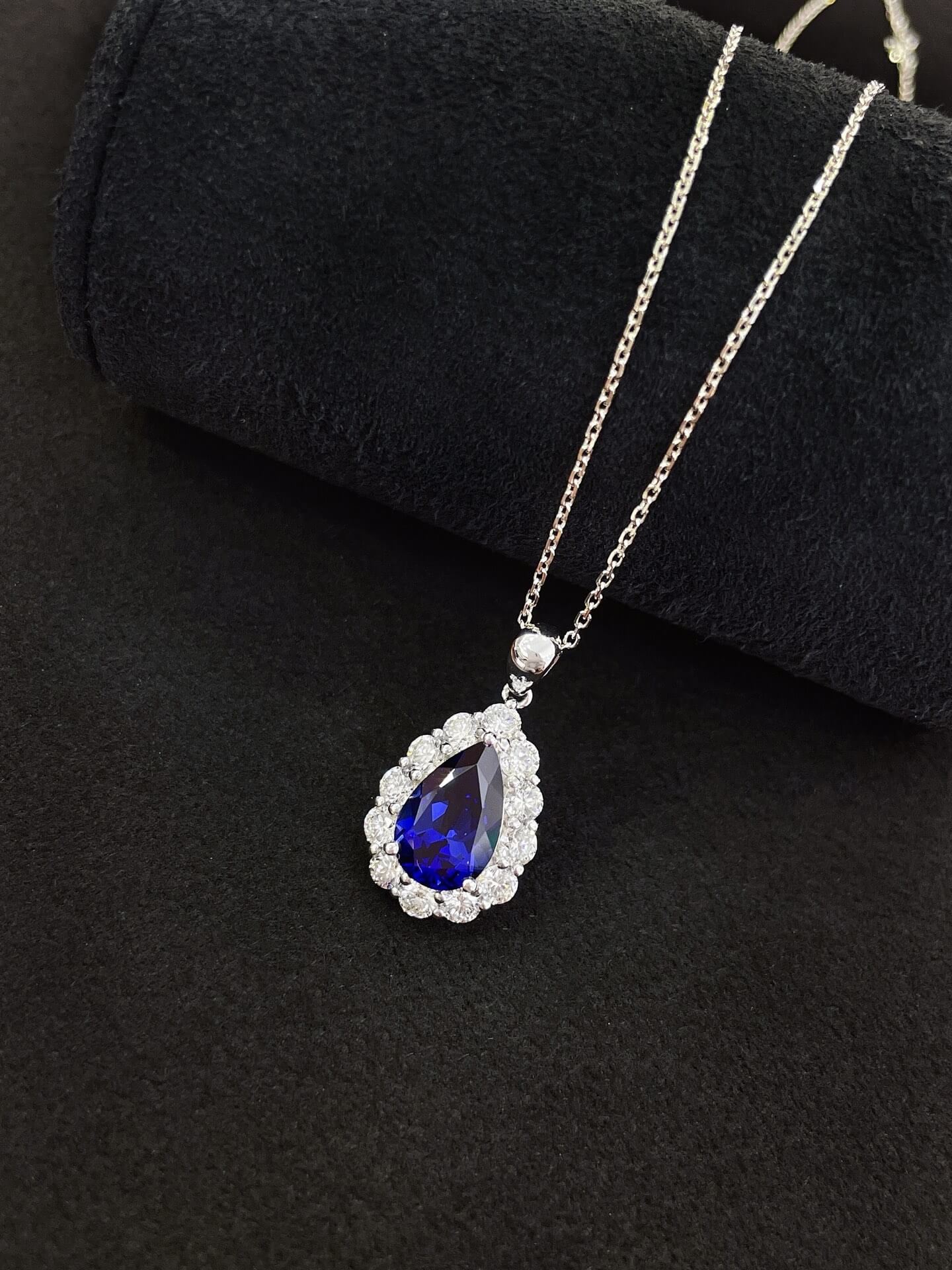 Halo setting pear cut lab grown sapphire pendant necklace 01 Halo setting pear cut lab grown sapphire pendant necklace 01