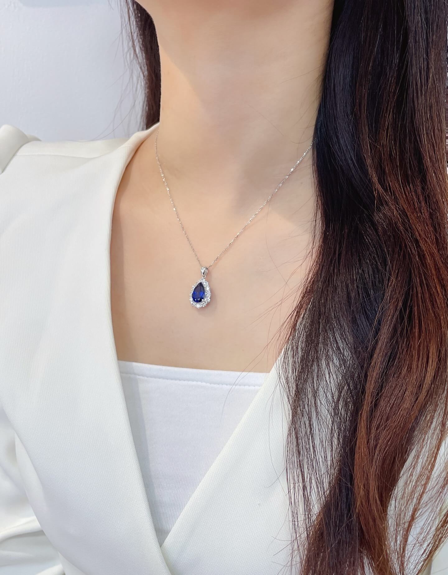 Halo setting pear cut lab grown sapphire pendant necklace 01 Halo setting pear cut lab grown sapphire pendant necklace 01