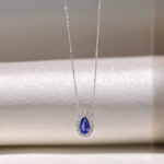Halo setting pear cut lab grown sapphire pendant necklace 2 Halo setting pear cut lab grown sapphire pendant necklace 02