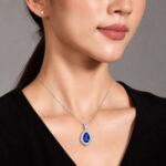 Halo setting pear cut lab grown sapphire pendant necklace 5 Halo setting pear cut lab grown sapphire pendant necklace 02
