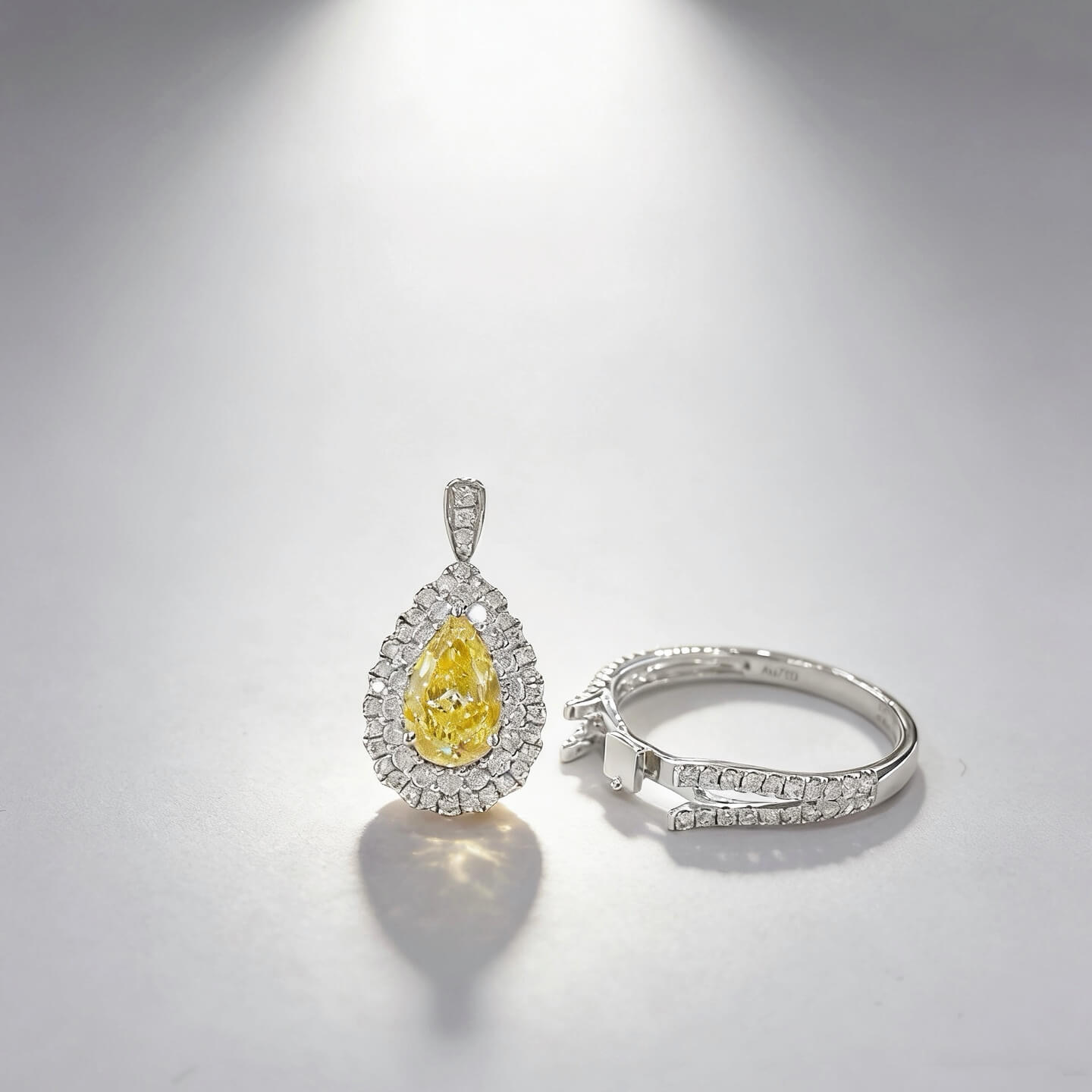 Halo setting pear cut lab grown yellow diamond engagement ring Halo setting pear cut lab grown yellow diamond engagement ring