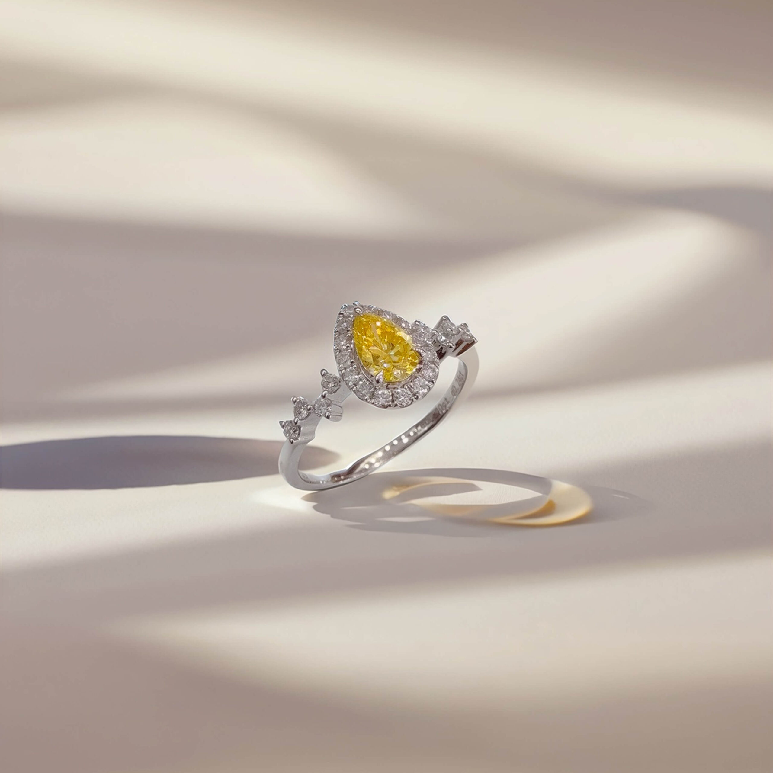 Halo setting pear cut lab grown yellow diamond engagement ring Halo setting pear cut lab grown yellow diamond engagement ring