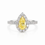 Halo setting pear cut lab grown yellow diamond engagement ring