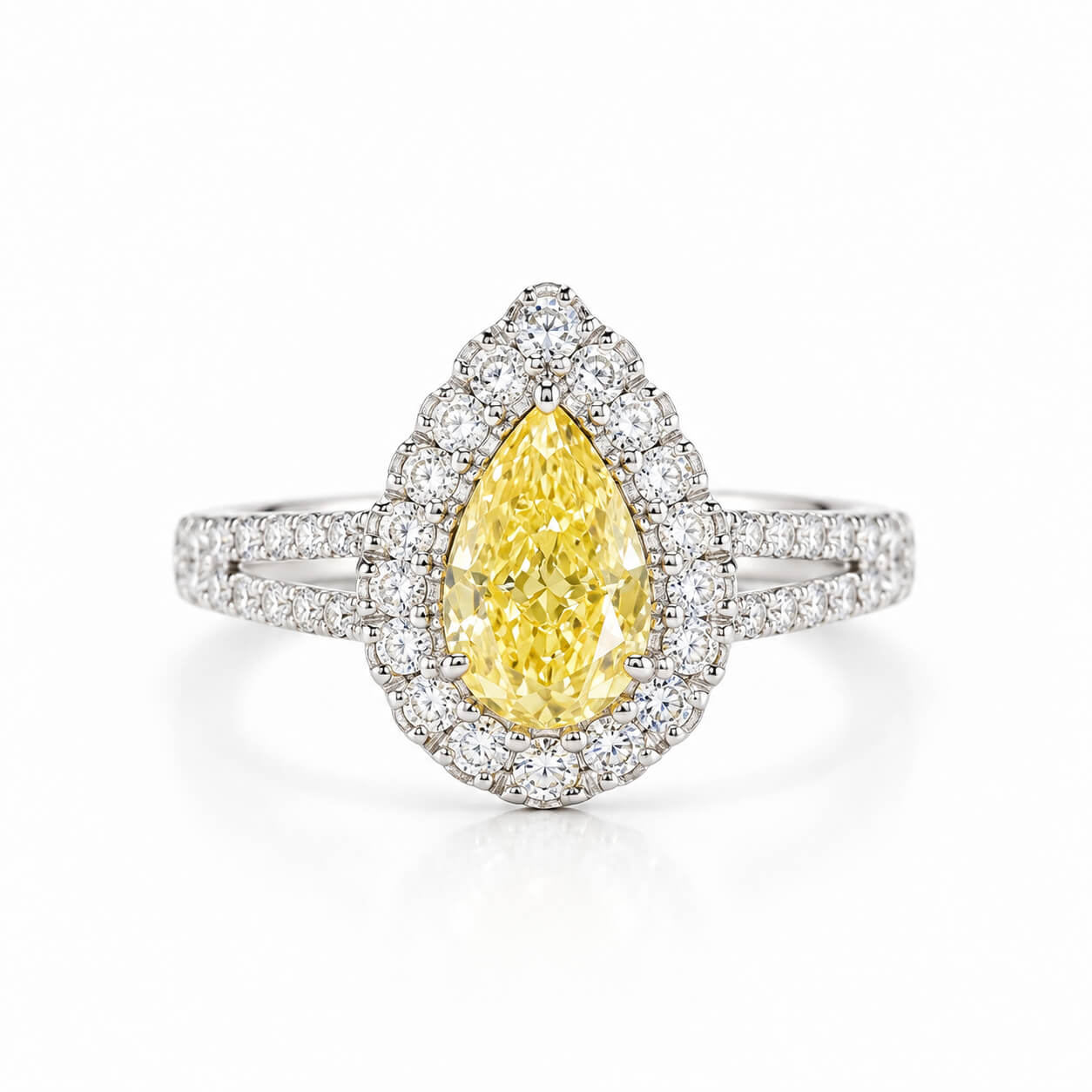 Halo setting pear cut lab grown yellow diamond engagement ring Halo setting pear cut lab grown yellow diamond engagement ring