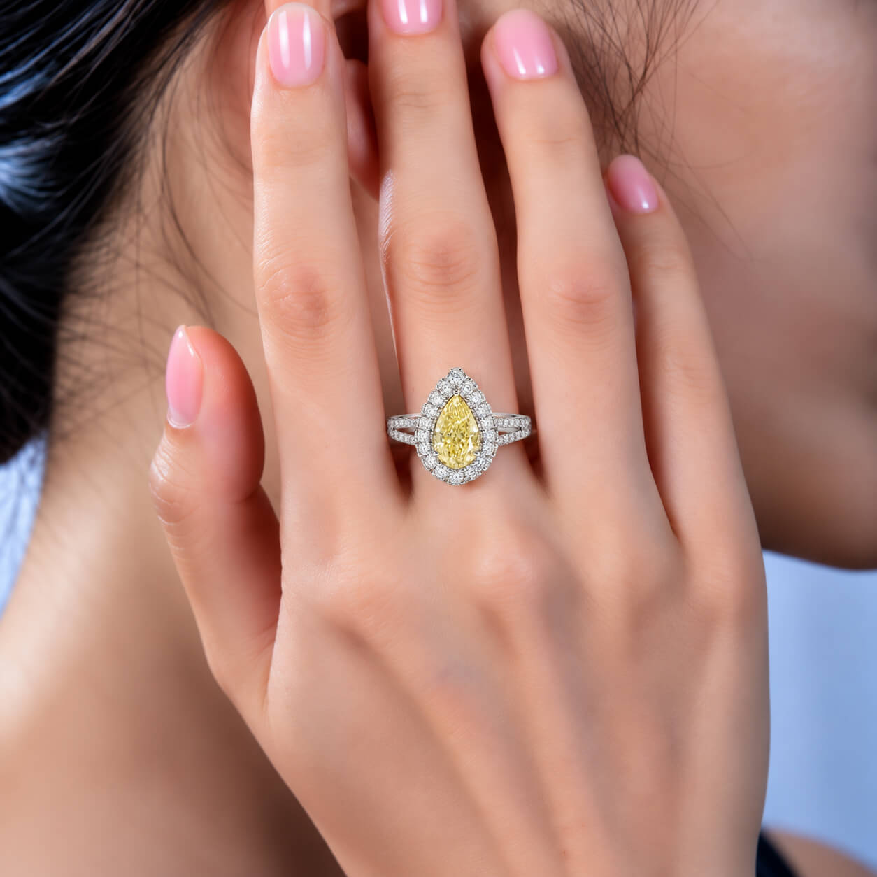 Halo setting pear cut lab grown yellow diamond engagement ring Halo setting pear cut lab grown yellow diamond engagement ring