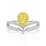 Halo setting pear cut lab grown yellow diamond engagement ring