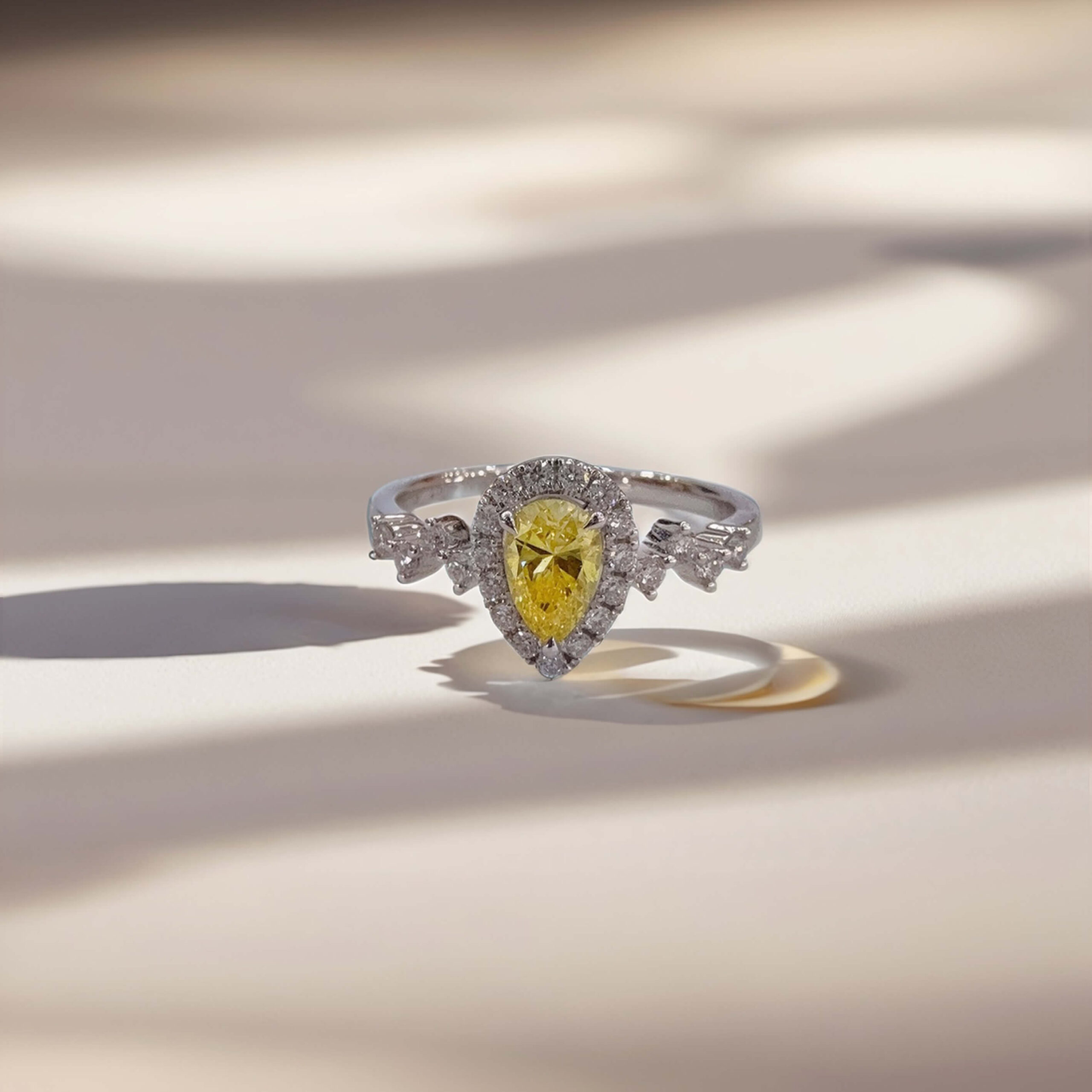 Halo setting pear cut lab grown yellow diamond engagement ring Halo setting pear cut lab grown yellow diamond engagement ring