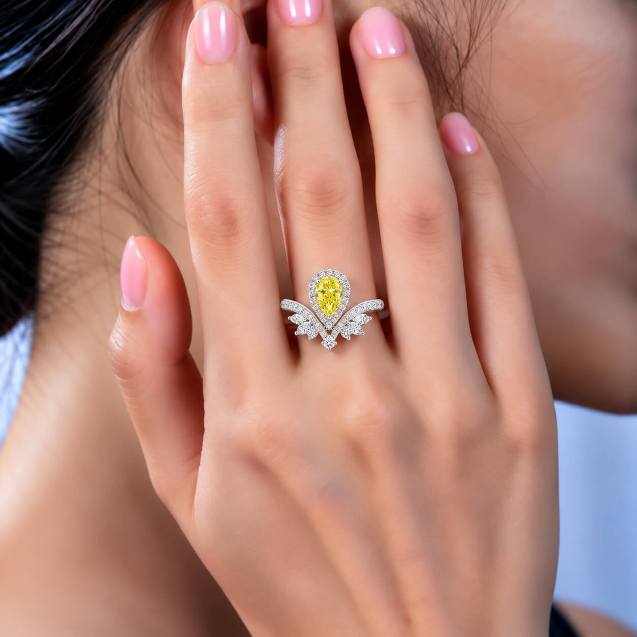 Halo setting pear cut lab grown yellow diamond engagement ring