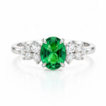Oval cut lab grown emerald engagement ring