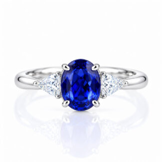 Oval cut lab grown sapphire three stones engagement ring
