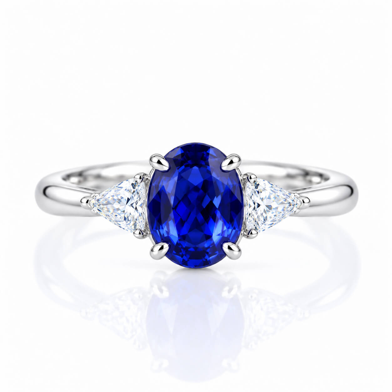 Oval cut lab grown sapphire three stones engagement ring