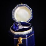 Oval cut lab grown sapphire three stones engagement ring