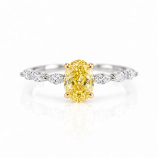 Oval cut lab grown yellow diamond engagement ring