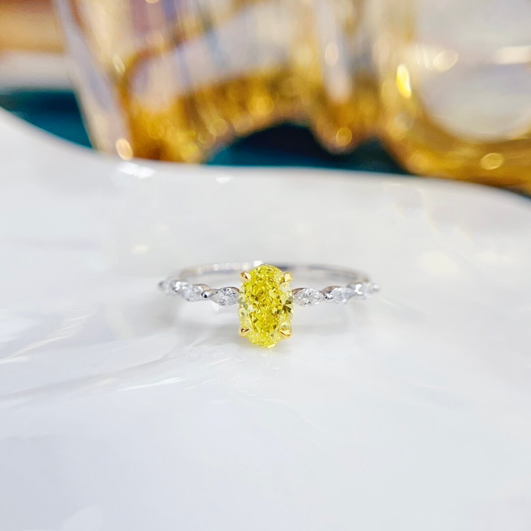 Oval cut lab grown yellow diamond engagement ring Oval cut lab grown yellow diamond engagement ring