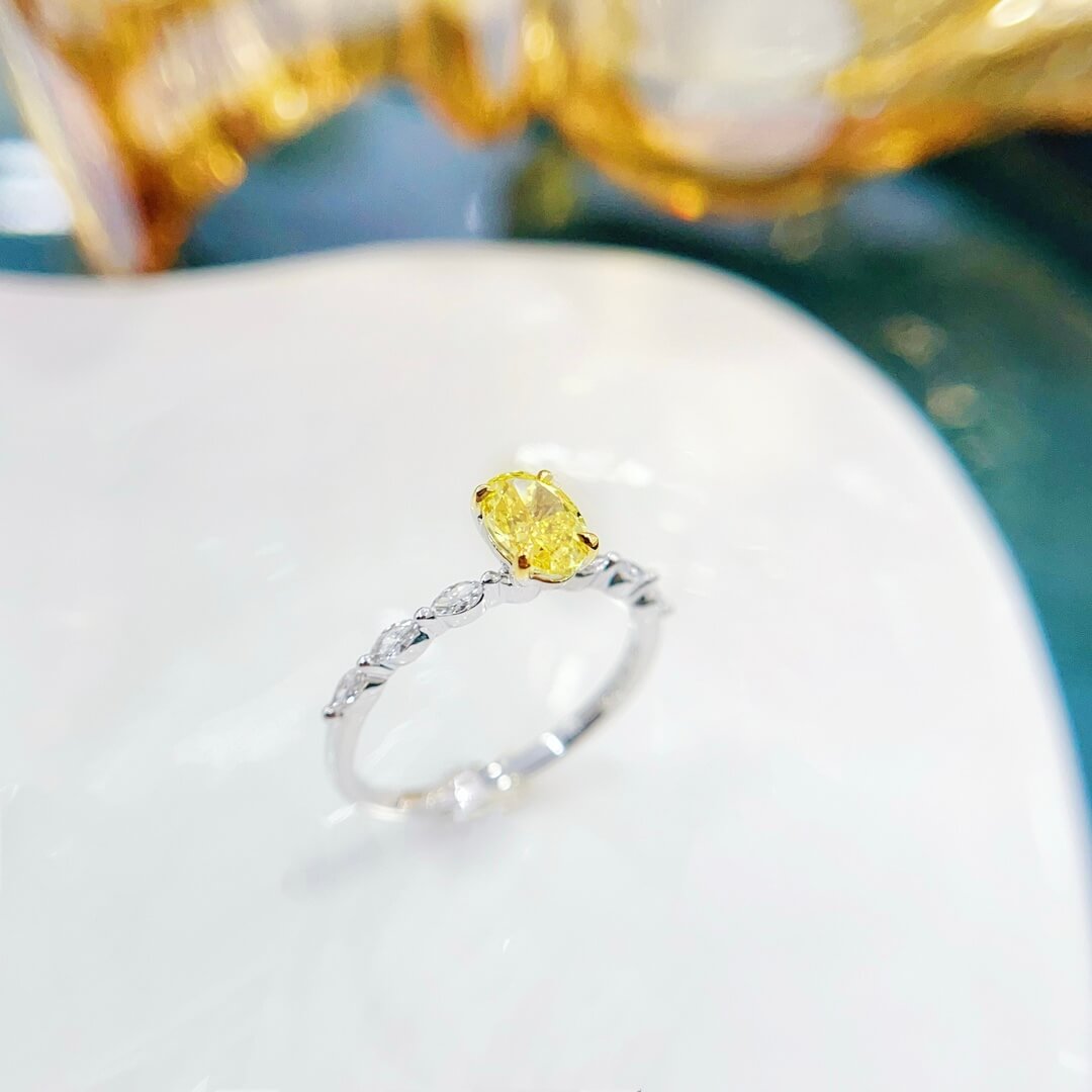 Oval cut lab grown yellow diamond engagement ring Oval cut lab grown yellow diamond engagement ring