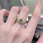 Pear cut lab grown green diamond engagement ring