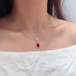 Pear cut lab grown ruby pendant necklace