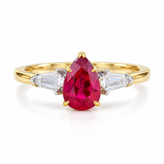 Accueil 27 Pear cut lab grown ruby three stones engagement ring