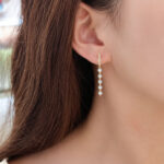 Round cut lab grown diamond tassel hoop earrings