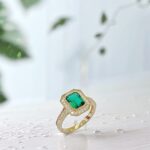 Vintage design lab grown emerald engagement ring